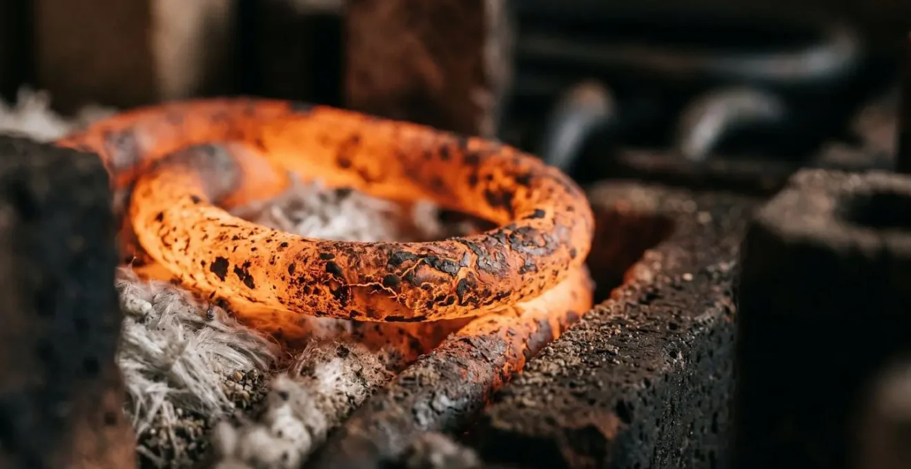 Extreme close-up of worn kiln heating element showing thermal degradation and maintenance costs